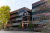 High Companies Building Exterior with spring trees